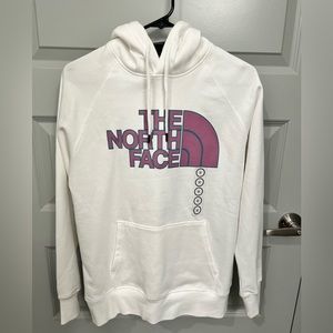 White North Face hoodie sweatshirt with purple logo. New with tags, size Medium.